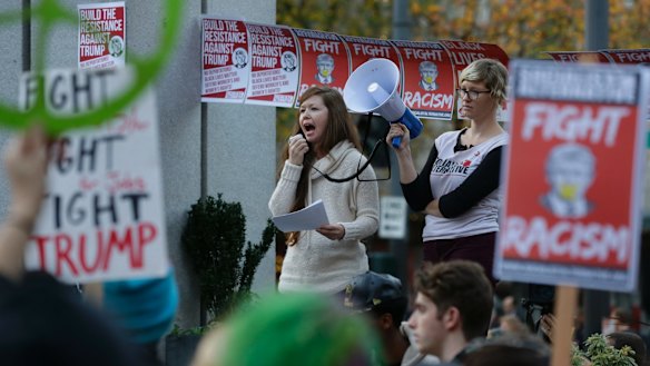 Protesters yell against the election of President-elect Donald Trump in Seattle. 