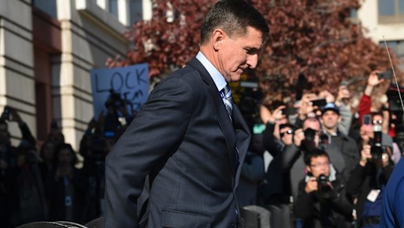 Michael Flynn leaves a federal court in Washington after pleading guilty.