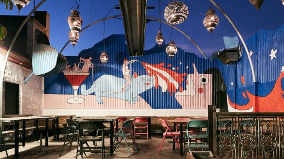 The rooftop beer garden at Bimbo, with a mural by Celeste Mountjoy (Filthy Ratbag).