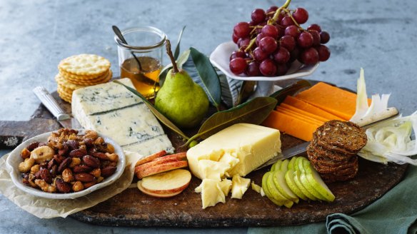 Create different heights to make a cheese plate look appealing.