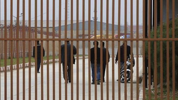 People cross through the Turkish border crossing into Syria in the outskirts of Kilis, south-eastern Turkey, this week. 