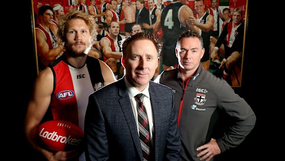 St Kilda lobbied for a pride game and have been given the go-ahead for a themed fixture against Sydney in round 21. Pictured are St Kilda footballer Sam Gilbert, CEO Matt Finnis and coach Alan Richardson.