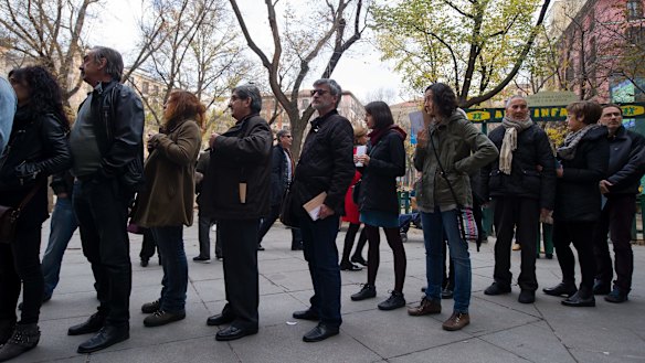 Queuing to vote in Madrid on Sunday. 