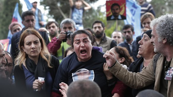 A relative of Serdar Ben, 33, one of the victims of the October 10 bombing, at  his funeral in Istanbul. 