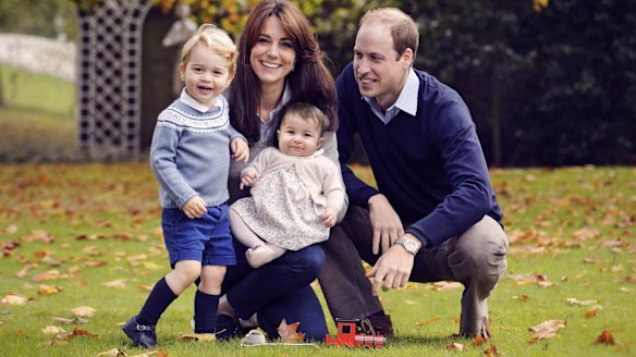 The Duke and Duchess of Cambridge with their two children, Prince George and Princess Charlotte, in a photograph taken late October 2015 at Kensington Palace in London.