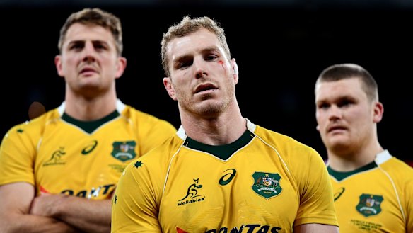 David Pocock of Australia (C) looks dejected after the final whistle during the Old Mutual Wealth Series match between England and Australia at Twickenham.