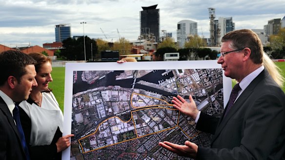 Former Victorian Premier Denis Napthine (right) and Planning Minister Matthew Guy (left) announce the Fisherman's Bend urban renewal in 2013.