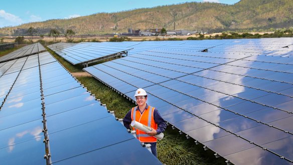 Sun Metals Corporation's Solar Project Manager Lance Moody inspects progress of the solar panels at Sun Metals.