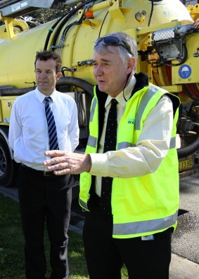 Sydney Water chief executive Kevin Young, right, suspected corrupt conduct. 