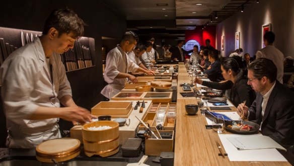Chefs at Kisume’s sushi bar face the diners.