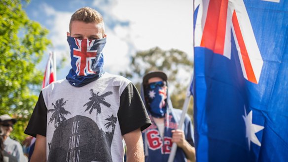 A Member of the group Reclaim Australia makes his feelings known.
