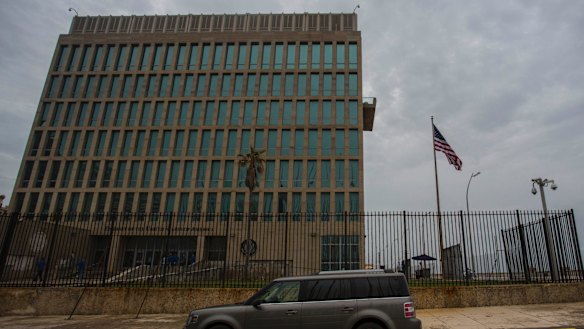 A car is parked outside the compound of the United States embassy in Havana, Cuba.