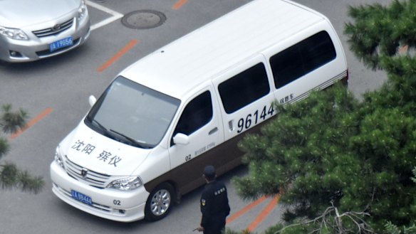 A vehicle believed to be carrying the body of Chinese Nobel Peace laureate Liu Xiaobo leaves a hospital in north-eastern China's Liaoning Province on Thursday.