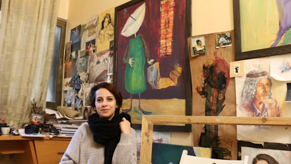 Majdal Nateel, 28, a Palestinian artist, in her studio in Gaza.