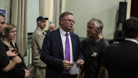 Mr Albanese was heckled by WestConnex opponents who blame him for offering funds for the motorway when he was transport minister.