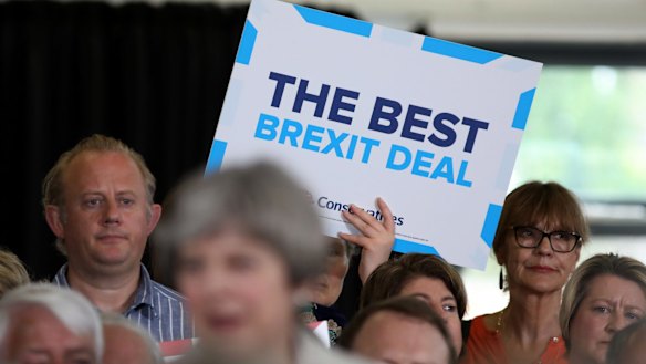 Theresa May, foreground, is trying to return the focus of the election to the question of how can best negotiate Britain's exit from the European Union.
