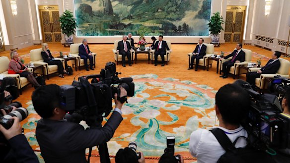 Great expectations: US Secretary of State Rex Tillerson and China's President Xi Jinping meet the press.