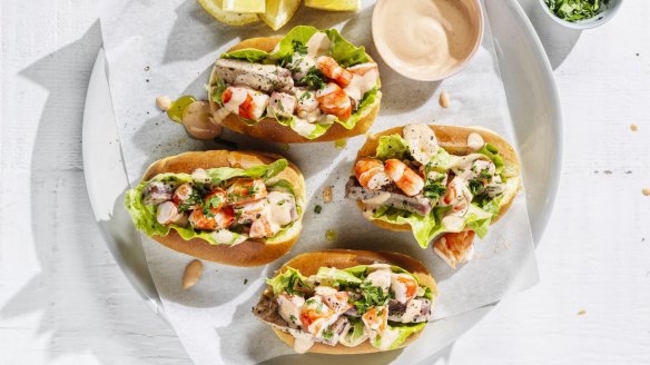 Seafood sandwich with spicy cocktail sauce.