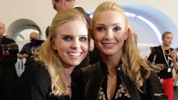 Susanne Thier, left, girlfriend of Foreign Minister Sebastian Kurz, and Philippa Strache, wife of Freedom Party leader Hans-Christian Strache, in Vienna, on Sunday.