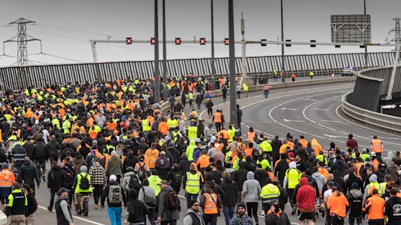 Thousands of angry protesters shut down parts of the city including the Westgate Bridge.