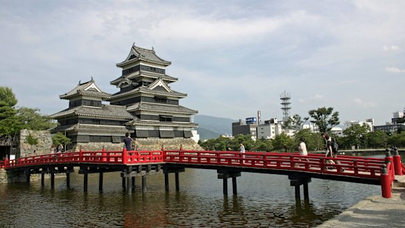 Matsumoto Castle and its red bridge.