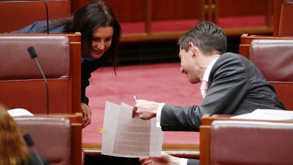 Minister for Education and Training Simon Birmingham  and Tasmanian senator Jacqui Lambie discuss the detail in the Senate.
