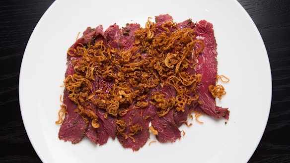 Kangaroo pastrami, cultured cream and crisp onions.