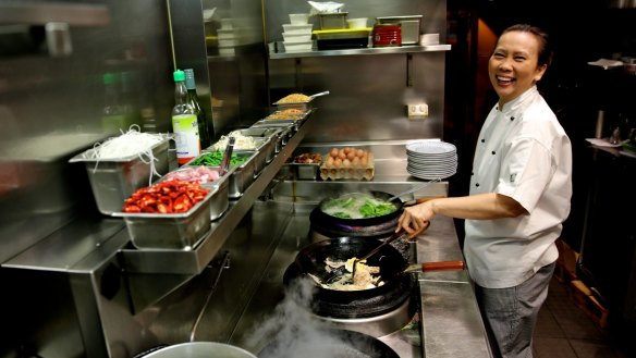 Amy Chanta cooking Pad Thai in Haymarket.