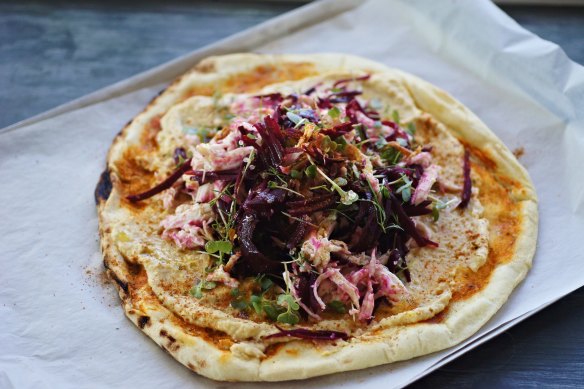 Chermoula chicken, beetroot and hummus pizza.