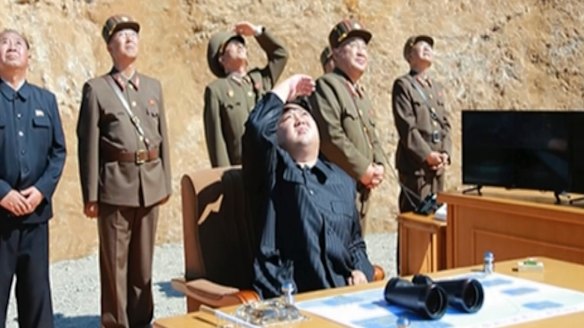 An image made from video of a news bulletin aired by North Korea's KRT on Tuesday shows what was said to be North Korea leader Kim Jung-un (centre) watching the launch of a Hwasong-14 intercontinental ballistic missile. 
Independent journalists were not given access to the event.