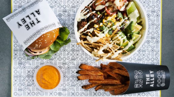 Maple Bacon Burger, taco bowl and sweet potato fries with smoky aioli at the Alley.