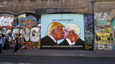 A Mural Showing Donald Trump Kissing Boris Johnson Appears In Britain