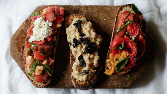 From left: Bruschetta with tomatoes mint and ricotta; cannellini beans, black olives and salami; peppers, capers and basil.