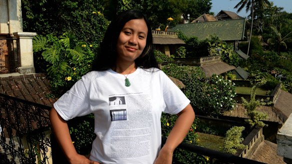 Silenced: Indonesian novelist Eliza Vitri Handayani wears her work in Ubud after a session launching her latest work was cancelled.