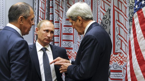 Russian President Vladimir Putin (centre) and Foreign Minister Sergey Lavrov, listen to US Secretary of State John Kerry at the UN earlier this week.