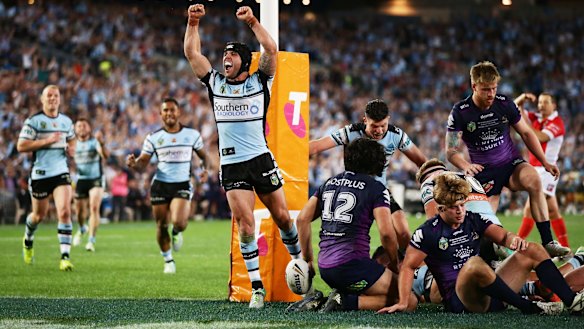 Sheer joy: Michael Ennis reacts to Andrew Fifita's game-winning try.