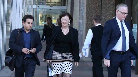 Journalists Linton Besser, Kate McClymont and Sean Nicholls outside the Supreme Court.