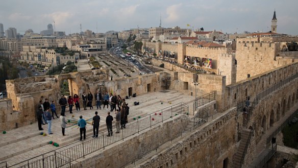 A group of Israelis on the walls of Tower of David compound in Jerusalem.