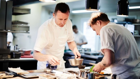 On a mission: Dan Hunter (left) in the kitchen at Brae.