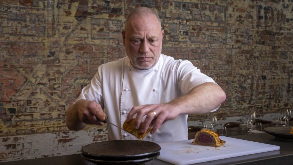 Chef Donovan Cooke plates up a beef Wellington at Ryne.