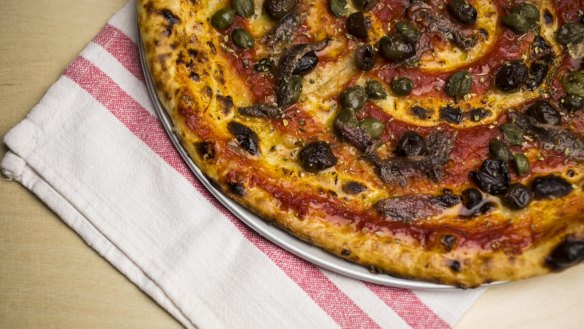 The pizza marinara is the go-to dish at the Dolphin Hotel.