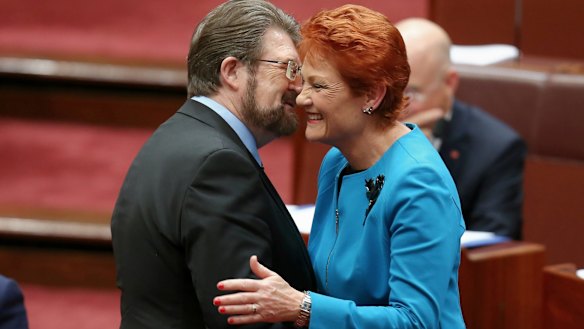 In happier times: Senator Hanson is congratulated by Senator Hinch after last year's election.