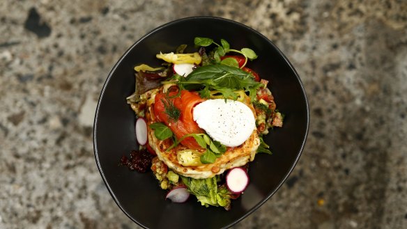 Corn, zucchini and haloumi fritters with smoked salmon: one of the highlights at Cook & Archies in Surry Hills.