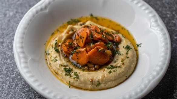 Shane Delia's harissa-roasted carrots with hummus.