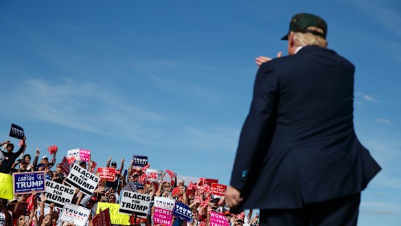 One man against the world: Donald Trump at a campaign rally in Florida.