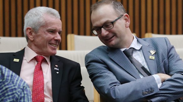 Senator Malcolm Roberts and adviser Sean Black.