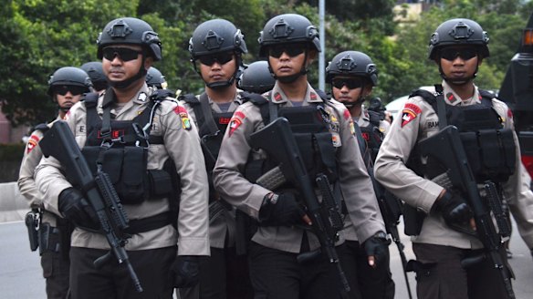 There was a heavy polcie presence ourside the court for day one of the trial of Jakarta governor Ahok.