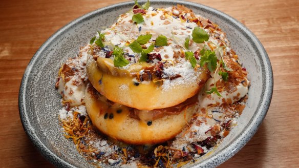 Buttermilk pancakes with white chocolate, caramel, passionfruit and yoghurt anglaise.