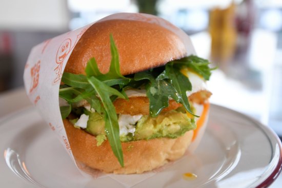 Egglab's breakfast burger with egg, avocado and hash brown.