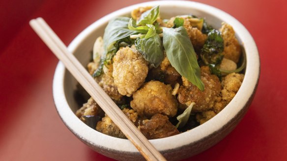 Crispy Taiwanese-style popcorn chicken with Thai basil and garlic.